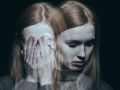 Girl covering her face