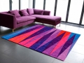 Sonya-Winner-Tri-Angles-orange-blue-area-rug-2_700x483q80.jpg