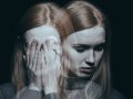 Girl covering her face