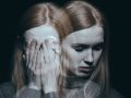 Girl covering her face