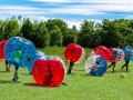 Children Playing  In Bubble Soccer Football‎  Outdoor