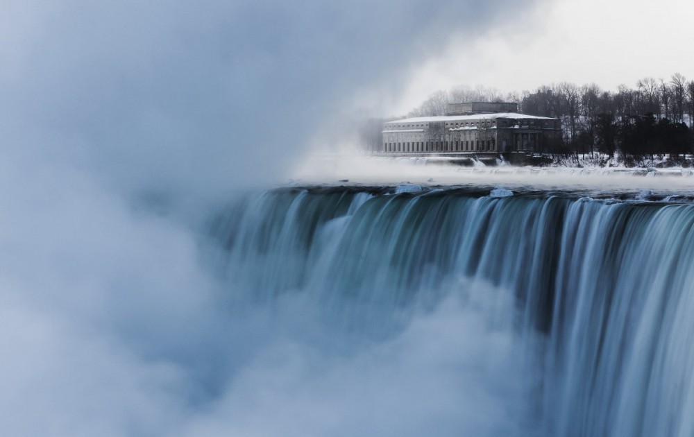 an-old-hydro-building-is-seen-behind-niagara-falls-during-sub-freezing-temperatures-in-niagara-falls-ontario.jpg